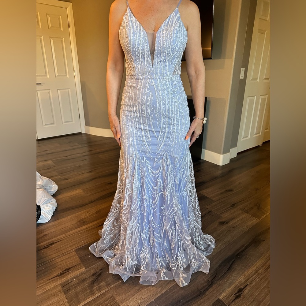 Stunning lavender crystal gown in brand new condition